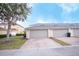 Attached garage with brick paver driveway at 16526 Cedar Crest Dr, Orlando, FL 32828