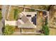 House with solar panels, a shed, and a spacious backyard at 203 North Cir, Davenport, FL 33837
