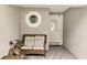 Cozy front porch with a small couch and a tiled floor at 203 North Cir, Davenport, FL 33837