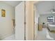 View of hallway with access to bathroom and bedroom at 203 North Cir, Davenport, FL 33837