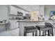 Modern kitchen with stainless steel appliances and granite countertops at 203 North Cir, Davenport, FL 33837