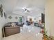 Spacious living room with open floor plan and kitchen view at 203 North Cir, Davenport, FL 33837