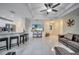 Open concept living room with kitchen island at 203 North Cir, Davenport, FL 33837