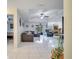 Spacious living room with tile floors and access to other rooms at 203 North Cir, Davenport, FL 33837