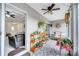 Cozy screened porch, perfect for relaxing, with access to the living room at 203 North Cir, Davenport, FL 33837
