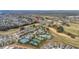 Aerial view of community amenities including tennis courts and pools at 2051 Flora Pass Pl, Kissimmee, FL 34747