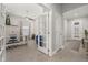 Home office with built-in shelving and hardwood floors at 2051 Flora Pass Pl, Kissimmee, FL 34747