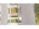 Top-down view of townhouse building, showing roof and driveway at 2226 Seven Oaks Dr, St Cloud, FL 34772