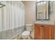 Clean bathroom with a toilet, vanity, and shower at 2226 Seven Oaks Dr, St Cloud, FL 34772