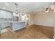 Modern kitchen with gray cabinets and an island at 2226 Seven Oaks Dr, St Cloud, FL 34772