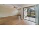 Living room with sliding glass doors leading to patio at 2226 Seven Oaks Dr, St Cloud, FL 34772