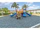 Community playground with colorful play equipment at 2226 Seven Oaks Dr, St Cloud, FL 34772