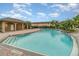 Community pool with a surrounding patio area at 2226 Seven Oaks Dr, St Cloud, FL 34772