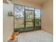 Cozy screened porch with a view of the backyard at 2226 Seven Oaks Dr, St Cloud, FL 34772