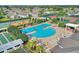 Aerial view of community pool, tennis courts, and clubhouse at 224 Fitzgerald Ln, Davenport, FL 33837