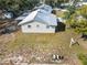 Aerial view of home highlighting the metal roof and well-kept landscaping at 2601 16Th St, St Cloud, FL 34769