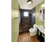 Bathroom featuring a tiled shower with a dark tile surround, vanity and fixtures at 2601 16Th St, St Cloud, FL 34769