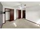 Bedroom with neutral carpet, ample natural light, and closet storage at 2601 16Th St, St Cloud, FL 34769