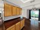 Dining area featuring hardwood floors, built-in cabinets, and sliding glass doors at 2601 16Th St, St Cloud, FL 34769