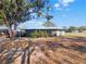 Charming single-story home with a metal roof and screened porch at 2601 16Th St, St Cloud, FL 34769