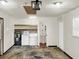 Spacious garage featuring washer, dryer, utility sink, and storage shelves at 2601 16Th St, St Cloud, FL 34769