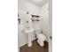 Cozy powder room with modern fixtures, sleek vanity, and stylish decorations at 2601 16Th St, St Cloud, FL 34769