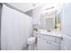 Well-appointed bathroom with white vanity and shower at 3 Pecan Drive Loop, Ocala, FL 34472
