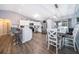 Modern kitchen with white cabinets and stainless steel appliances at 3 Pecan Drive Loop, Ocala, FL 34472