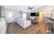 Living room with sectional sofa and view of kitchen at 3 Pecan Drive Loop, Ocala, FL 34472