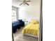 Bright bedroom with two twin beds, large window and tile flooring at 345 Forestway Cir # 106, Altamonte Springs, FL 32701