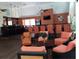 Inviting clubhouse lounge area with comfortable seating and stylish bar area at 345 Forestway Cir # 106, Altamonte Springs, FL 32701