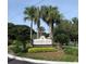 Welcome to Lakewood Park at Altamonte Springs sign with palm trees at 345 Forestway Cir # 106, Altamonte Springs, FL 32701