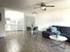 Open living room and dining area with tile floors and contemporary furnishings at 345 Forestway Cir # 106, Altamonte Springs, FL 32701