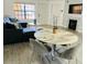 Living and dining area with tile floors, fireplace, and neutral decor at 345 Forestway Cir # 106, Altamonte Springs, FL 32701