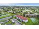 Aerial view of a well-maintained community with lush landscaping, pool, and amenities at 3701 Castle Pines Ln # 3927, Orlando, FL 32839