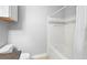 Bathroom with shower/tub combo, tile flooring, and a linen cabinet at 3701 Castle Pines Ln # 3927, Orlando, FL 32839