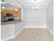 Bright dining area with tile floors and crown molding at 3701 Castle Pines Ln # 3927, Orlando, FL 32839