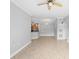 Combined dining and living room with tile floors and an open layout at 3701 Castle Pines Ln # 3927, Orlando, FL 32839