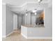 Granite kitchen island with stainless steel appliances at 3701 Castle Pines Ln # 3927, Orlando, FL 32839
