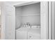 Shared laundry closet with washer and dryer at 3701 Castle Pines Ln # 3927, Orlando, FL 32839