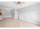 Open concept living and dining area with tile floors and ceiling fan at 3701 Castle Pines Ln # 3927, Orlando, FL 32839