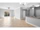 Large living room featuring tiled floors and sliding door to patio at 3701 Castle Pines Ln # 3927, Orlando, FL 32839