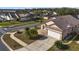 House with solar panels and a view of the neighborhood at 4525 Oakbrook Ct, Kissimmee, FL 34746