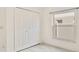 Bedroom with double door closet and window at 4525 Oakbrook Ct, Kissimmee, FL 34746