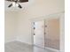 Bedroom with sliding glass doors leading to backyard at 4525 Oakbrook Ct, Kissimmee, FL 34746