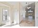 Bright kitchen with white cabinets and stainless steel appliances at 4525 Oakbrook Ct, Kissimmee, FL 34746