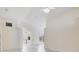 Open living area with access to kitchen and hallway at 4525 Oakbrook Ct, Kissimmee, FL 34746