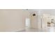 Spacious living room with tile floors and neutral walls at 4525 Oakbrook Ct, Kissimmee, FL 34746