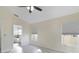 Spacious Primary bedroom with bathroom access and large windows at 4525 Oakbrook Ct, Kissimmee, FL 34746