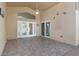 Covered patio with tile floor, pool access, and sliding doors at 4525 Oakbrook Ct, Kissimmee, FL 34746